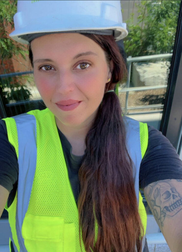 Photo of tradeswoman Nicole Raymond on a job site