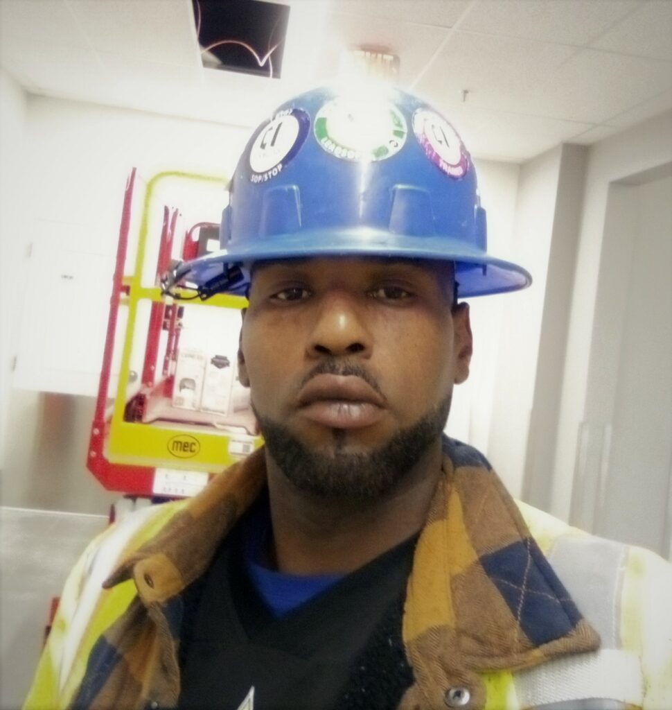 Photo of Antonio Jordan, electrician, on a job site.